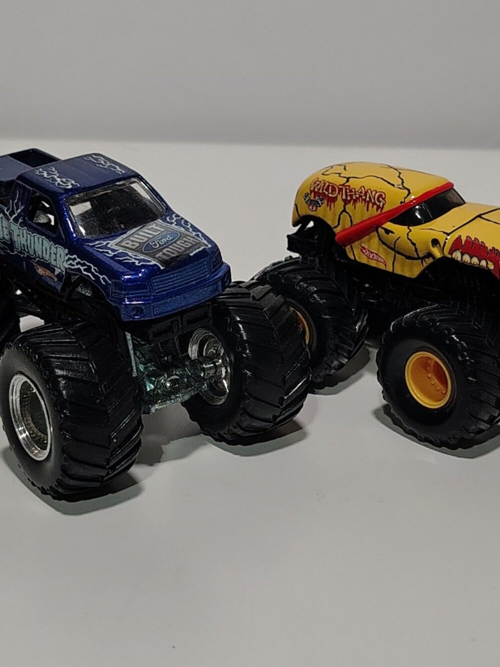 Vintage Hot Wheels Monster Jam Wild Thang Blue Thunder 1:64 Truck Lot of 2